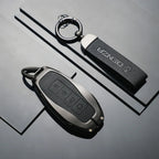 Professional black leather and metal key fob covers for DENZA car keys.