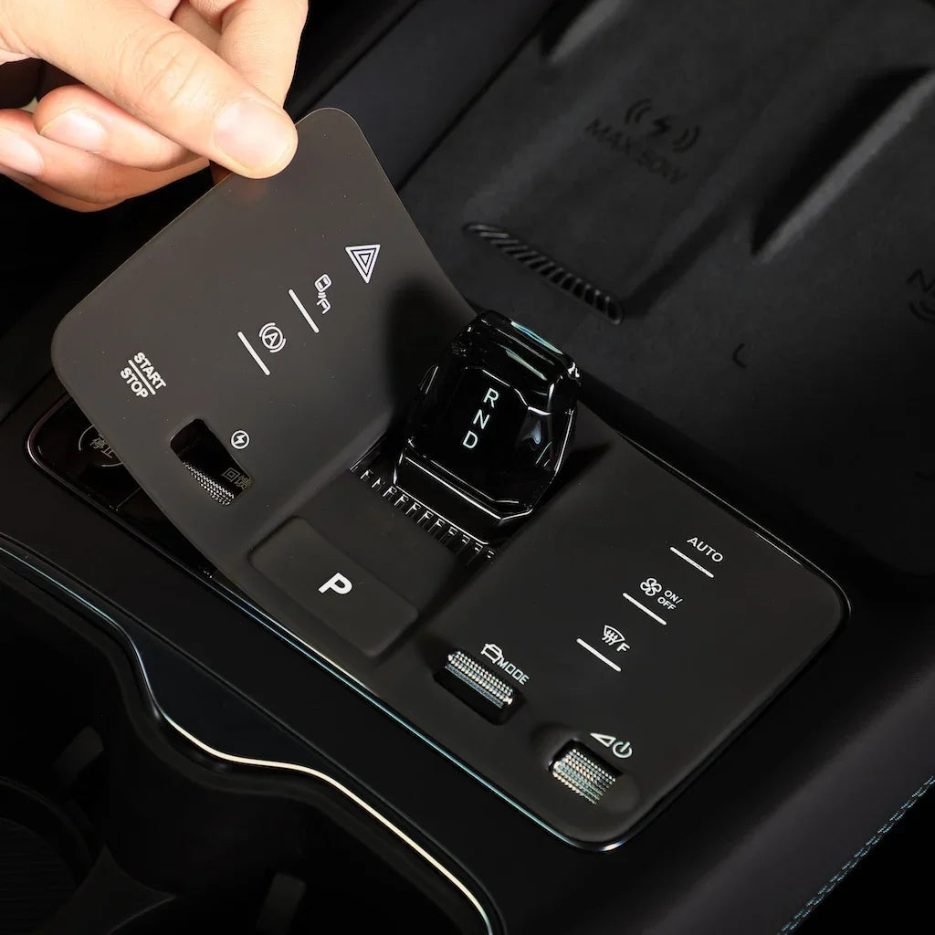 Sleek black matte center console trim for BYD, featuring integrated gear shifter and controls.