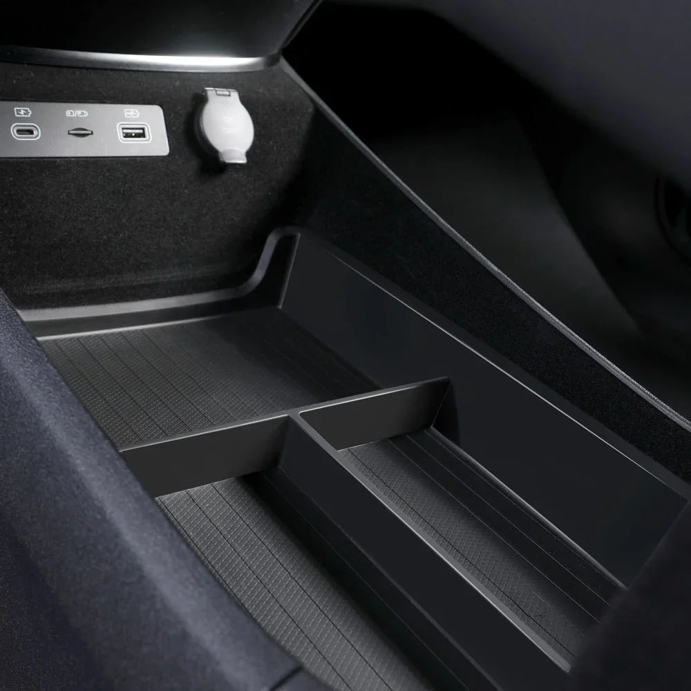 Black heavy-duty TPE car trunk organizer tray with divided compartments for organized storage.