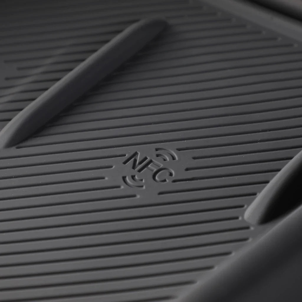 Black textured TPE car floor mat featuring an integrated NFC chip for smart connectivity.