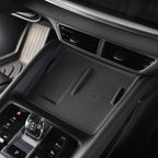 Black silicone wireless charging mat installed on a BYD car center console for efficient charging.