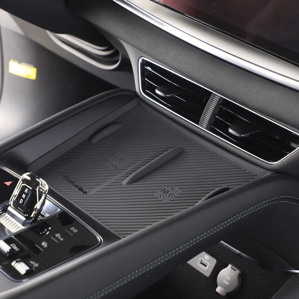 Black textured anti-slip silicone center console mat for BYD vehicle interior protection.