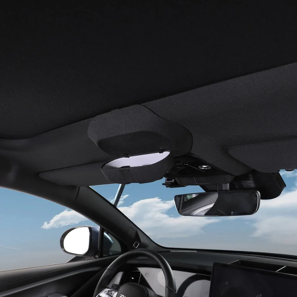 Black fabric car sun visor organizer with a convenient storage pocket for small items.
