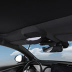 Black fabric car sun visor organizer with a convenient storage pocket for small items.