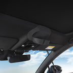 Black fabric car sun visor with integrated storage compartment for organized interior storage.