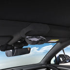 Black fabric car sun visor with integrated storage compartment for organized interior storage.