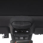Black fabric-covered interior trim component with a durable matte finish.