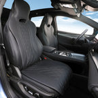 Black quilted leather car seat covers with diamond stitching for a luxury interior.