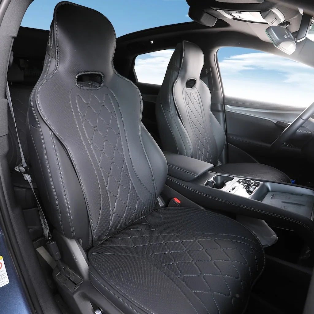 Premium black quilted leather car seat covers with diamond stitching for a sporty interior.
