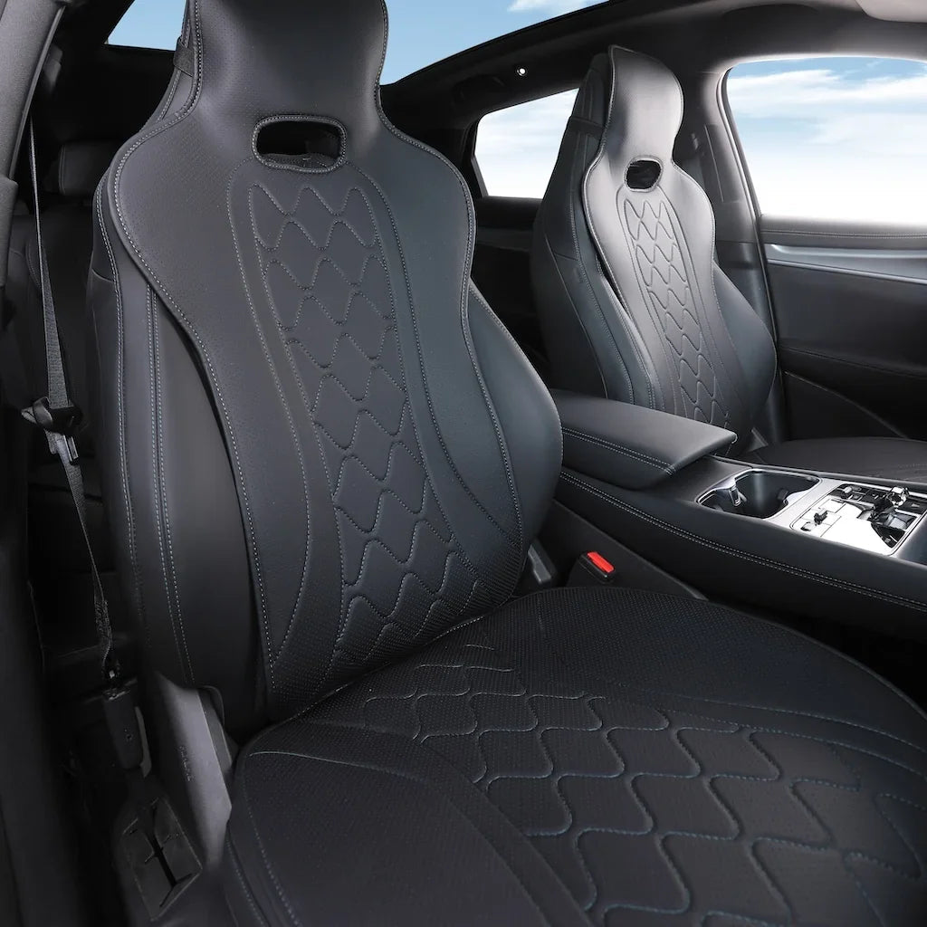 Black leather BYD car seats featuring a unique quilted diamond stitch pattern.