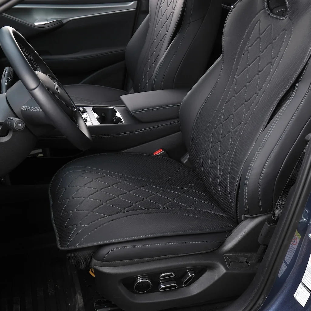 Professional black leather car seat covers with diamond-quilted stitching for BYD interiors.