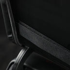 Black durable fabric edge detail of a premium car seat protector accessory.