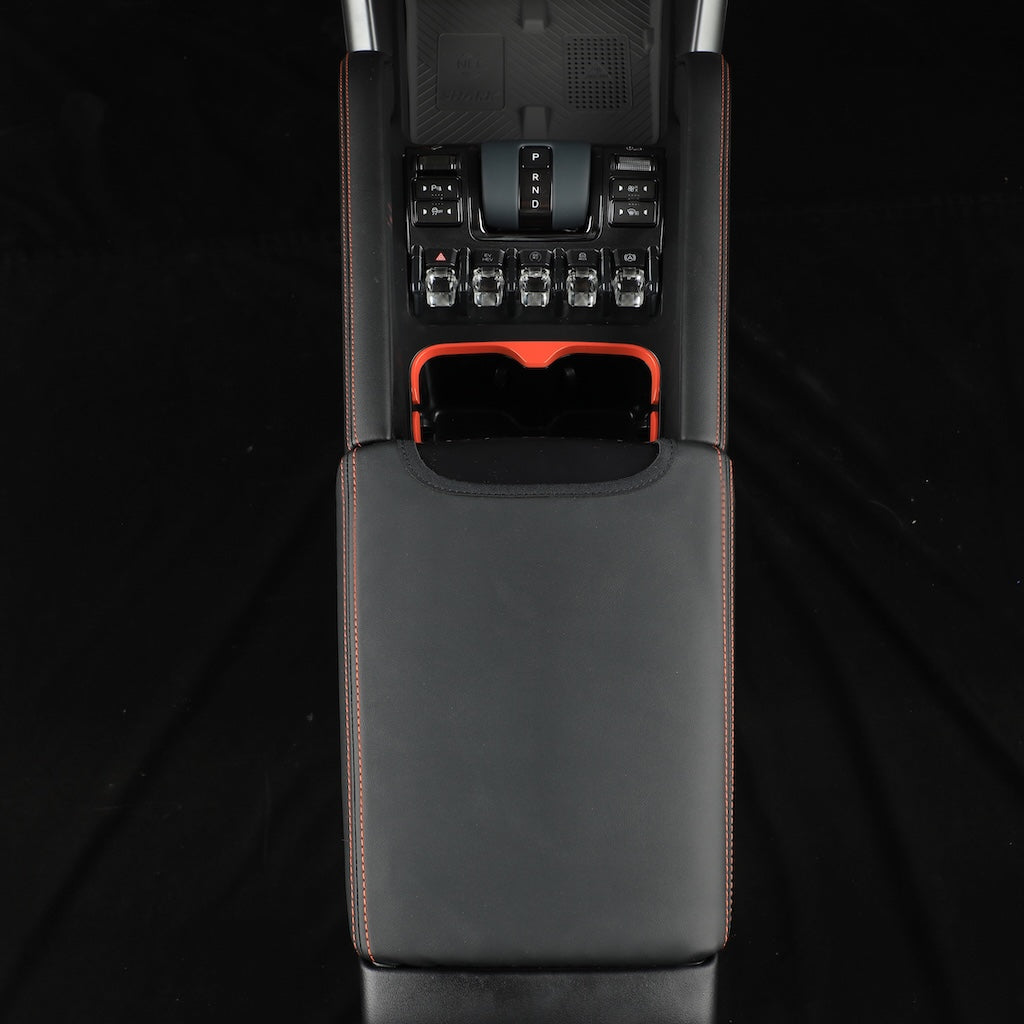 Black leather center console cover with premium red contrast stitching for BYD interior protection.