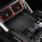 BYD Shark center console with orange accents and textured black materials.
