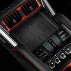 BYD Shark center console with black textured finish and red metallic accents