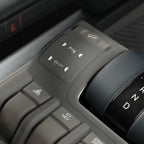Black matte finish interior control panel featuring silver-etched P-sensor and EV/HEV buttons.