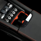 Black leather center console with red stitching and orange trim accents for BYD interior protection.