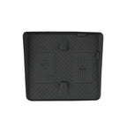 Black textured rubber car center console tray with NFC charging area and Shark branding.