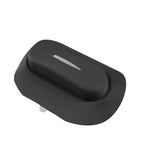 Black textured faux leather car sun visor with a sleek silver trim detail.
