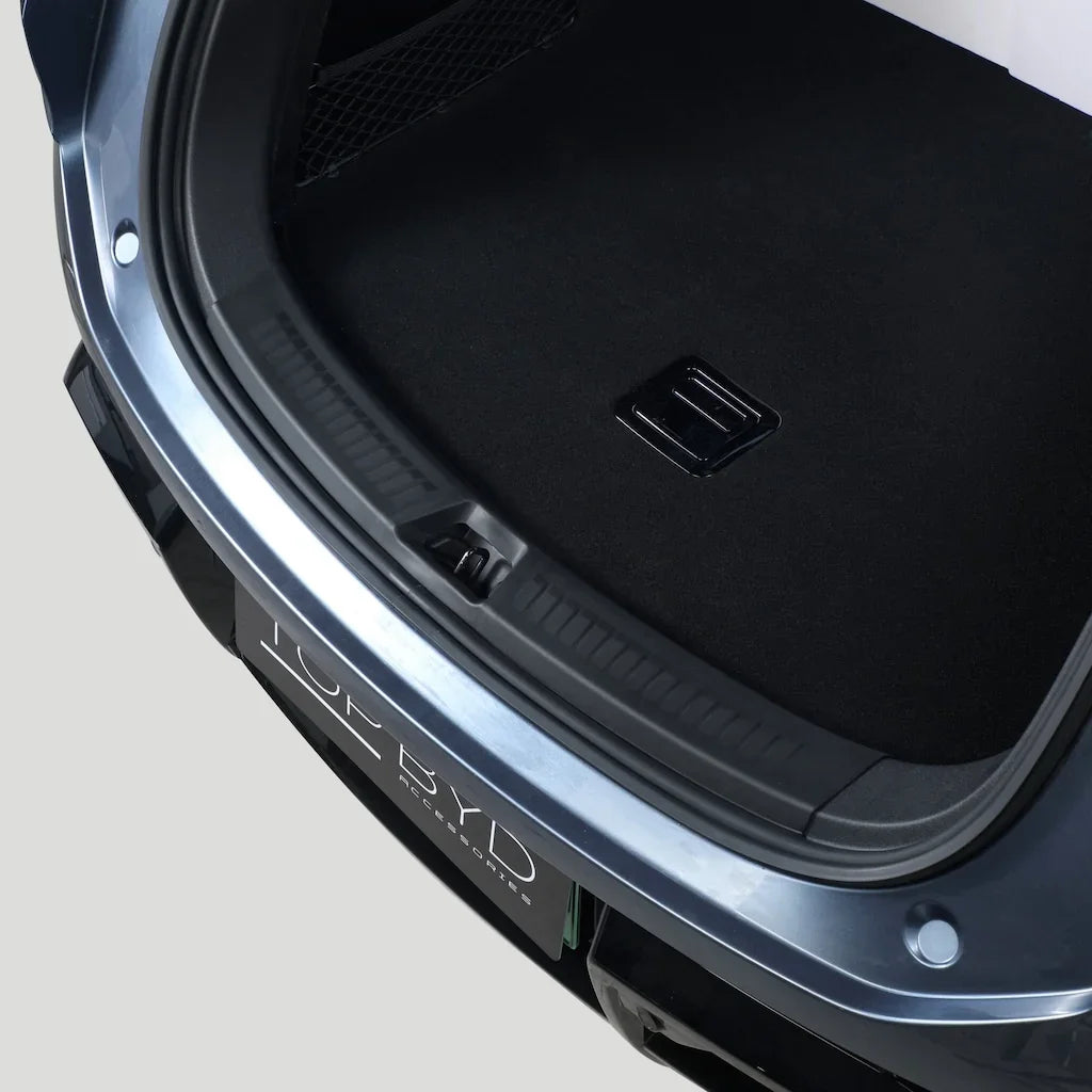 Black custom-fit heavy-duty car trunk mat for premium interior protection.