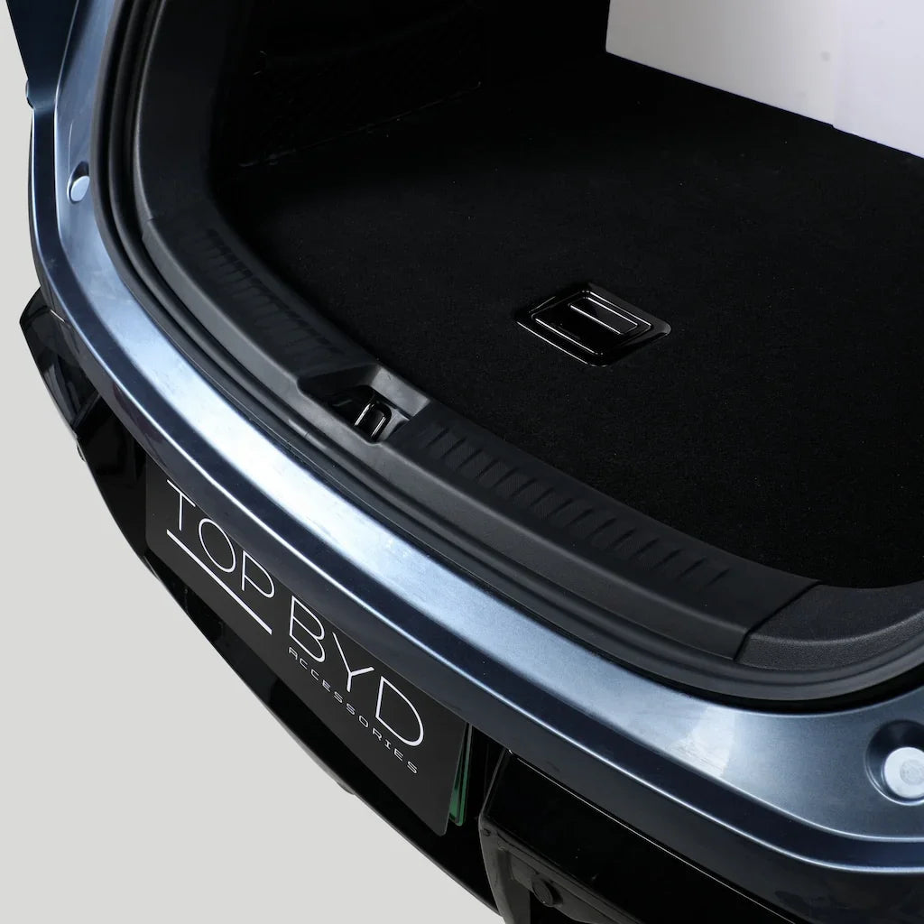 Black heavy-duty protective cargo mat installed in the trunk of a blue BYD vehicle.