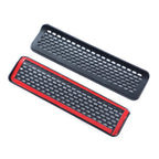 Black perforated mesh car vent grille with a distinctive red trim accent.