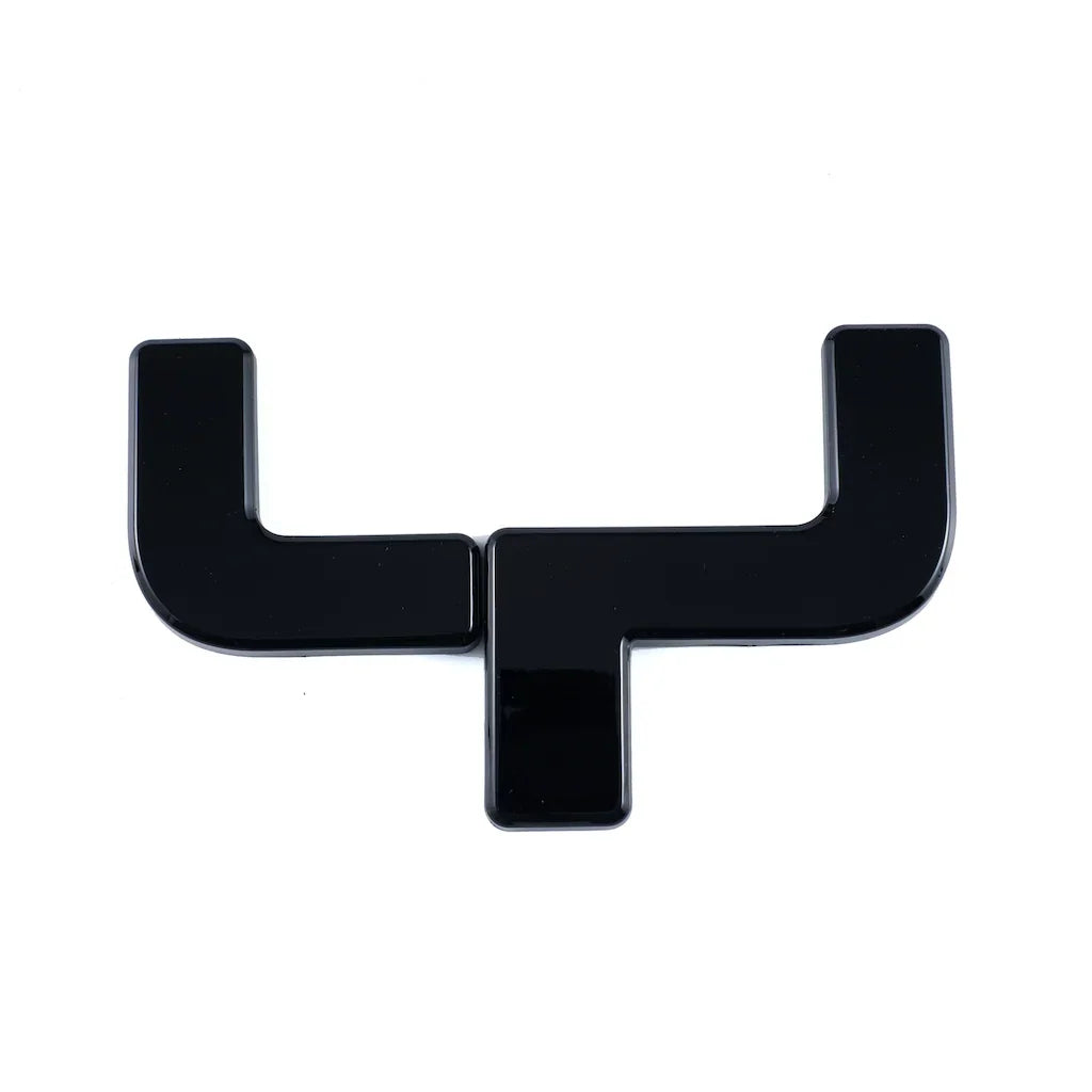 Glossy black emblem badge made of high-quality durable material for car exterior decoration.