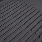Close-up of grey synthetic leather car mat with professional parallel stitching