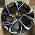 Black and silver dual-tone metallic alloy wheel rim for BYD vehicle protection.
