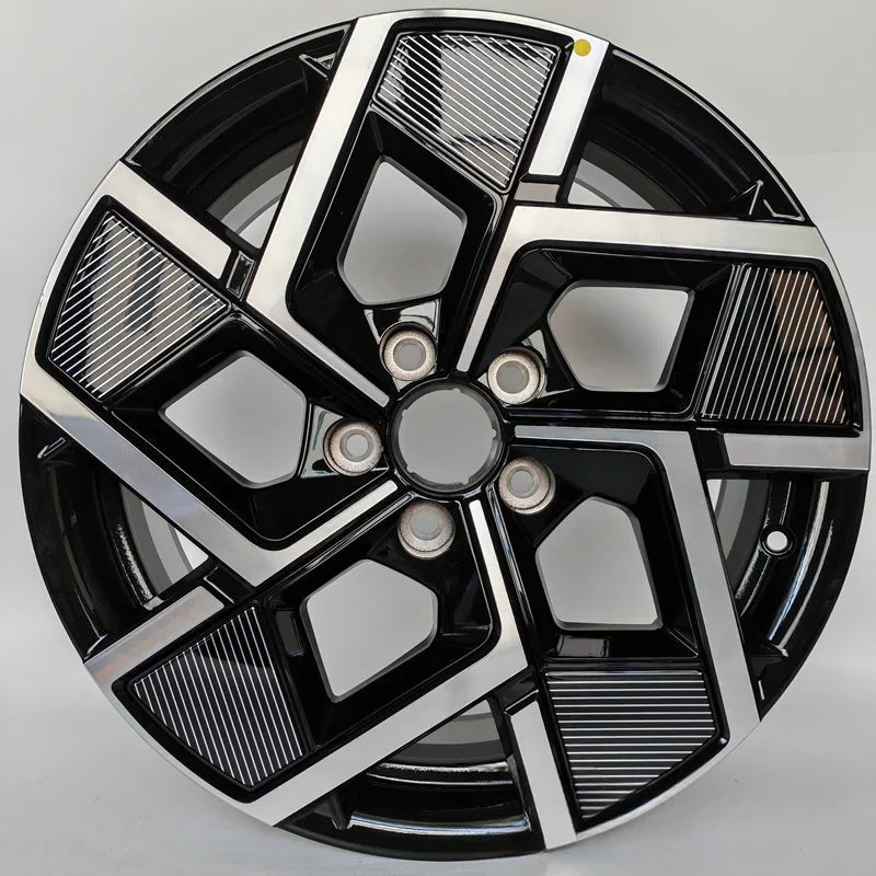 Black and silver dual-tone alloy car wheel rim with a sleek geometric spoke design.