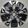 Premium black and silver dual-tone plastic wheel cover with a sleek aerodynamic spoke design.