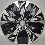 Premium black and silver dual-tone plastic wheel cover with a sleek aerodynamic spoke design.