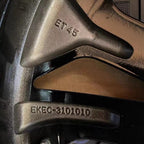 Matte black alloy car wheel rim featuring ET45 offset and EKEC-3101010 serial markings.