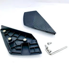 Black textured anti-slip pedal covers with silver metal mounting screws and Allen key.