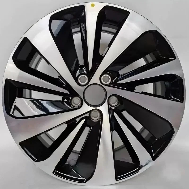 Polished chrome and black dual-tone multi-spoke alloy wheel rim for BYD vehicles.