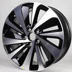 Premium multi-spoke alloy car wheel rim featuring a sleek black and polished silver dual-tone finish.