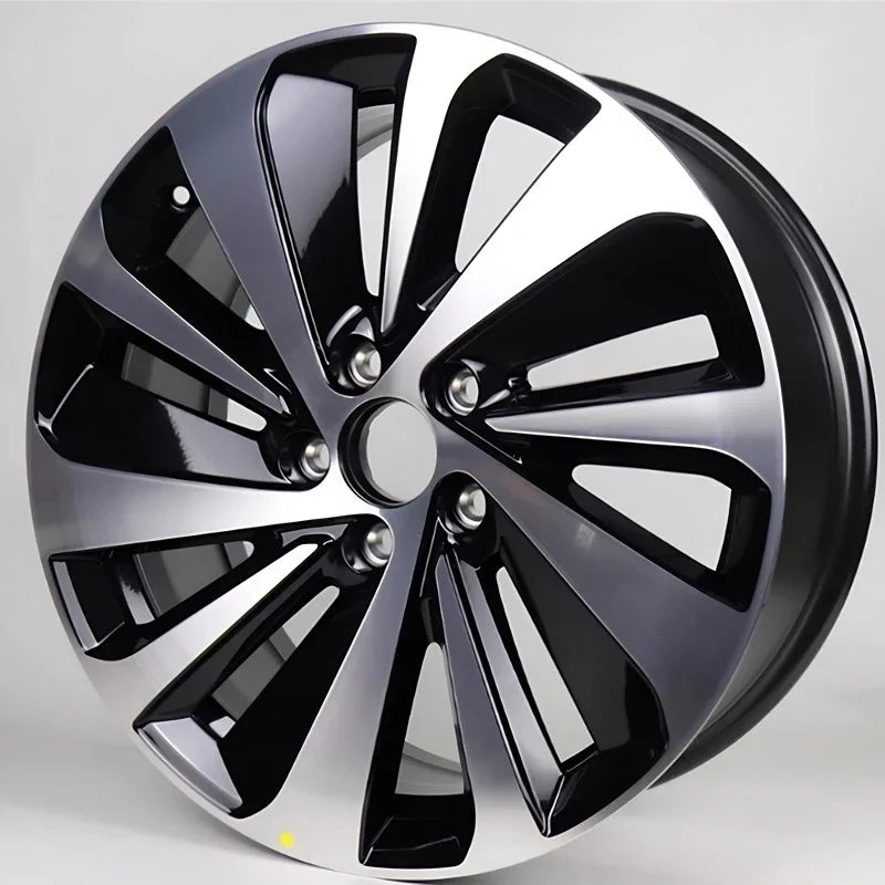 Premium multi-spoke alloy car wheel rim featuring a sleek black and polished silver dual-tone finish.