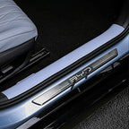 Sleek silver metallic BYD door sill protector with textured anti-slip surface.