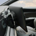 Black leather swivel screen protector with a ribbed mounting base for a car interior.