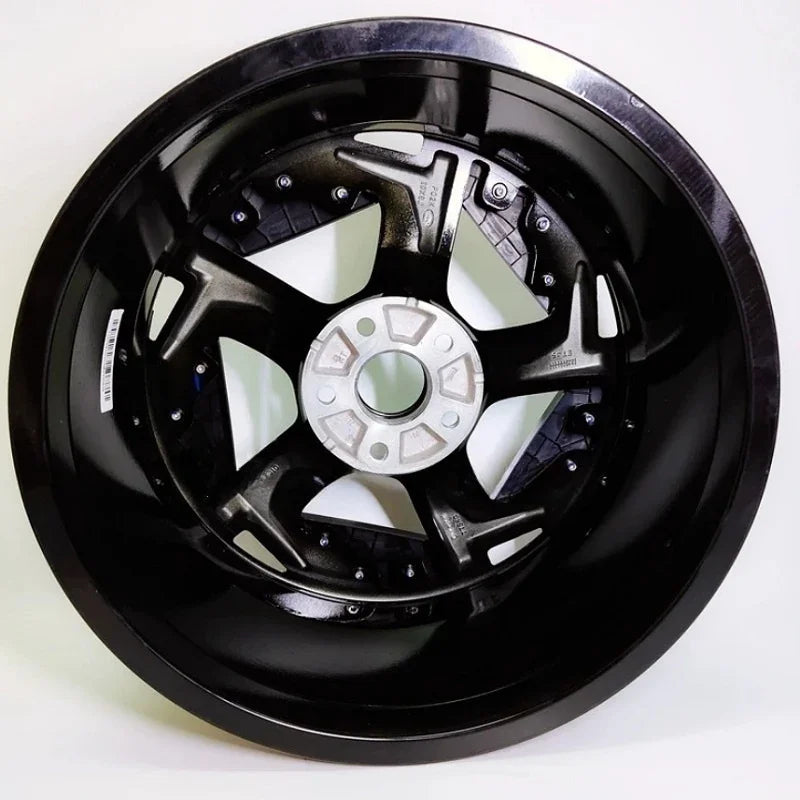 Glossy black five-spoke alloy car wheel rim with a durable metallic finish.