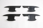 Set of four matte black Shark branded door sill protectors for BYD vehicle protection.