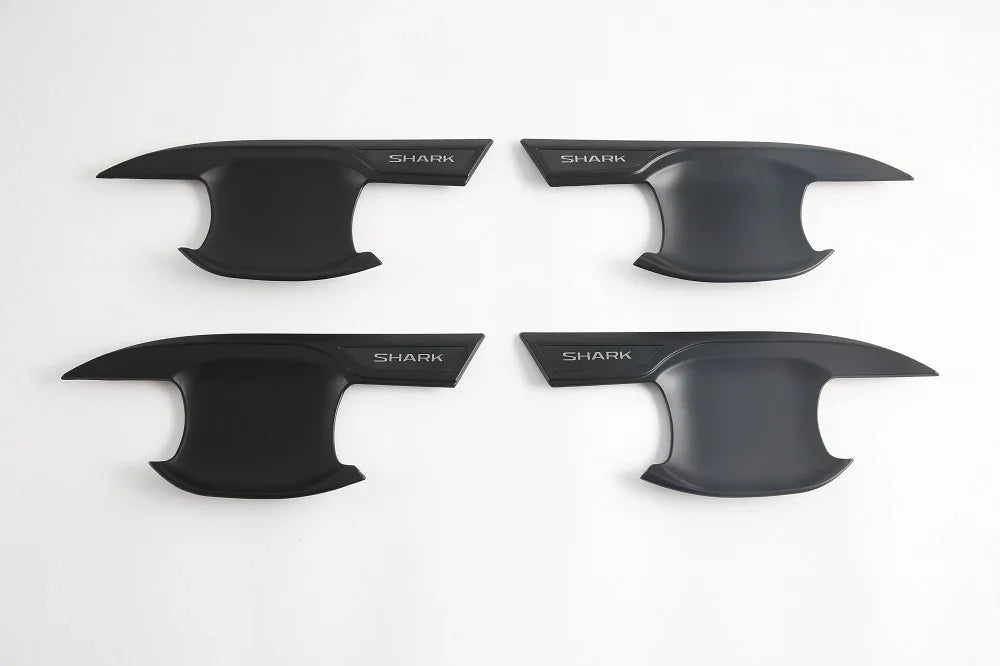 Set of four matte black Shark branded door sill protectors for BYD vehicle protection.