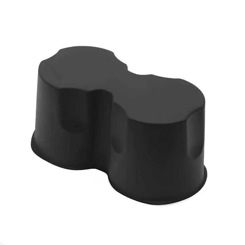 Matte black custom-fit rubber cup holder extender for BYD vehicle interior.