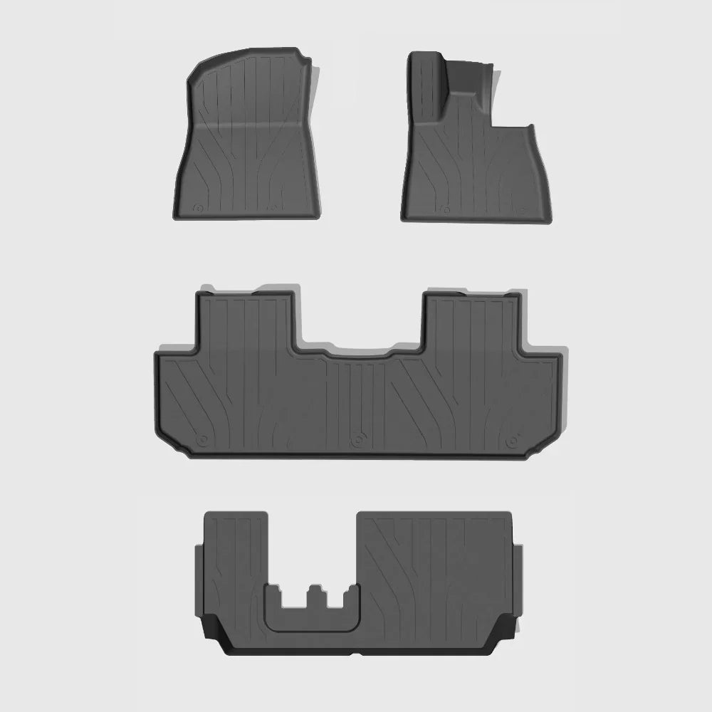 Set of professional grey TPE custom-fit car floor mats with deep grooves for maximum protection.