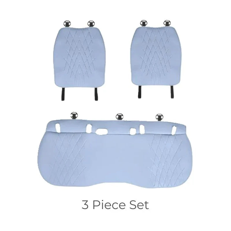 3-piece light blue diamond-stitched leather car headrest and dashboard cover set.