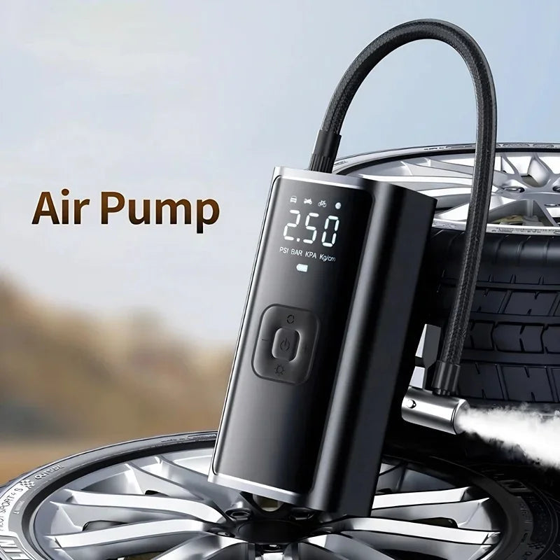 Portable black digital air pump with LED display inflating a car tire.