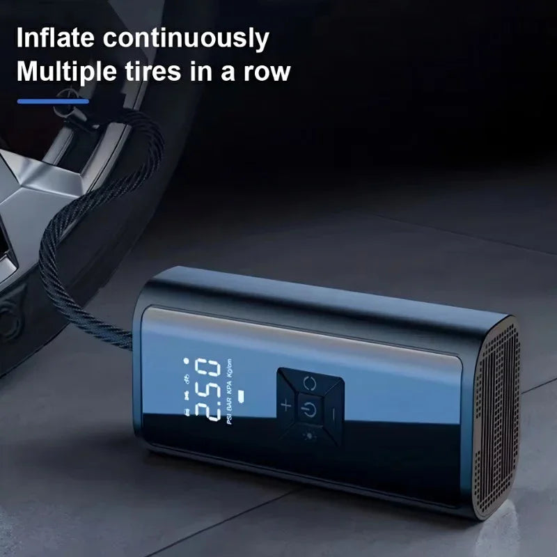 Portable black digital tire inflator with LED display connected to a car tire via braided hose.