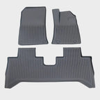 Custom-fit grey TPE waterproof car floor mats with anti-slip ribbed texture for BYD protection.