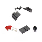 Black metal car seat gap filler kit with red protective strips and mounting hardware.