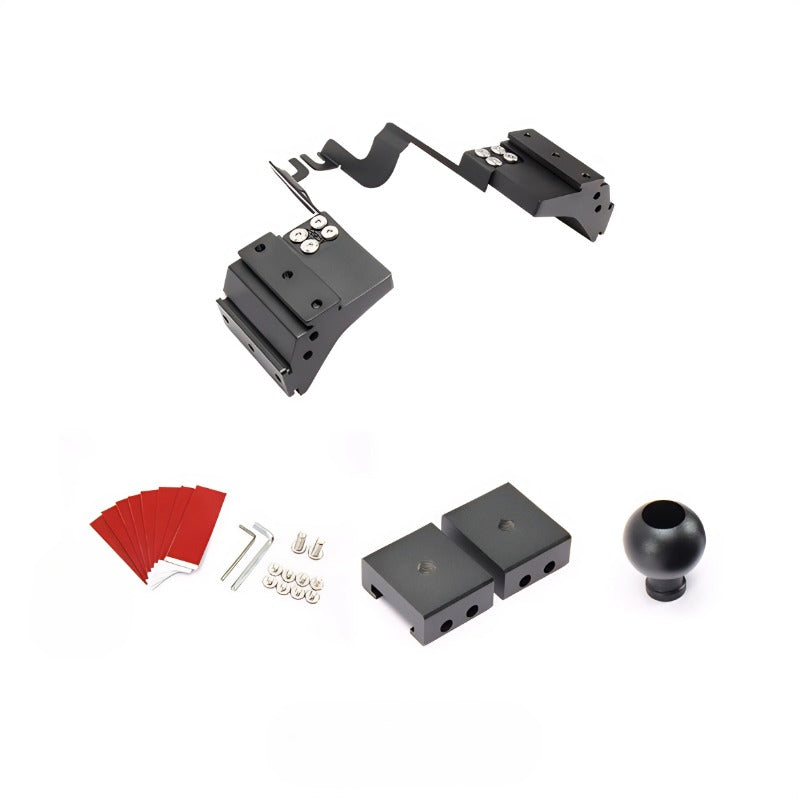 Black metal car seat gap filler kit with red protective strips and mounting hardware.